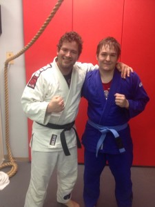 Holden with Master Danny Ives right after his promotion to BJJ Blue Belt 