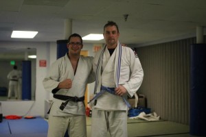 A very happy new BJJ blue belt promoted by Master Danny Ives