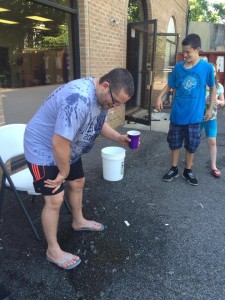 Danny Ives gets ice water dumped all over him! Fine, it's all good he's still the master of corn hole!