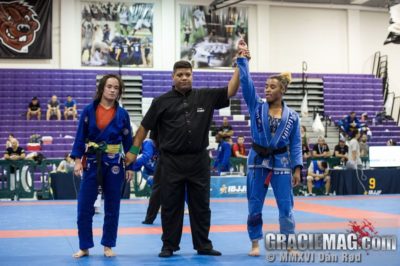 Pictured with her hand raised is top ranked Black Belt AaRae Alexander.