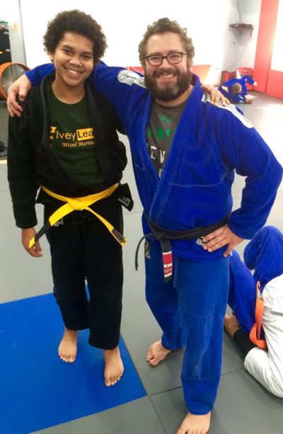 Longtime student and happy-go-lucky kid Deuce Boucher right after being promoted to BJJ Yellow Belt by Master Danny